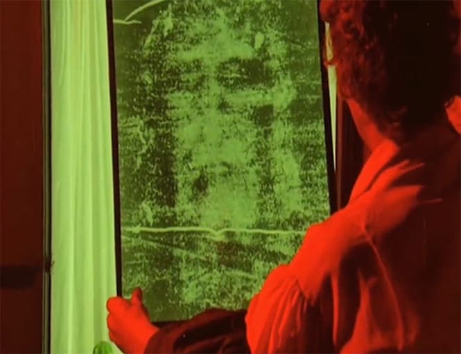 Secondo Pia examining the Shroud photograph